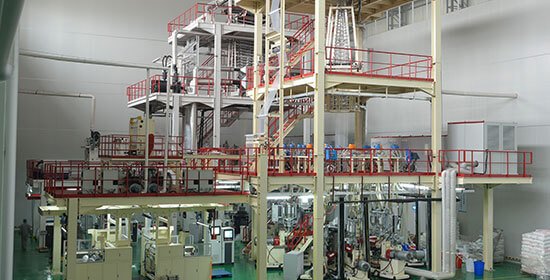 金明精机的9层共挤高端包装膜成型设备涂布农膜大型设备